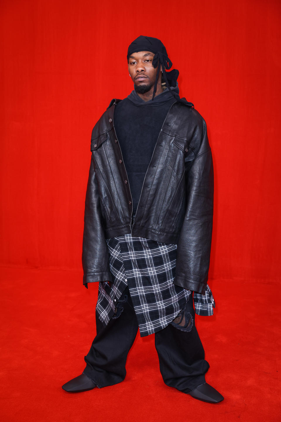 Rapper Offset poses on the runway during the Balenciaga Womenswear Spring/Summer 2022 show as part of Paris Fashion Week at Theatre Du Chatelet on October 02, 2021 in Paris, France. - Credit: Richard Bord/Getty Images
