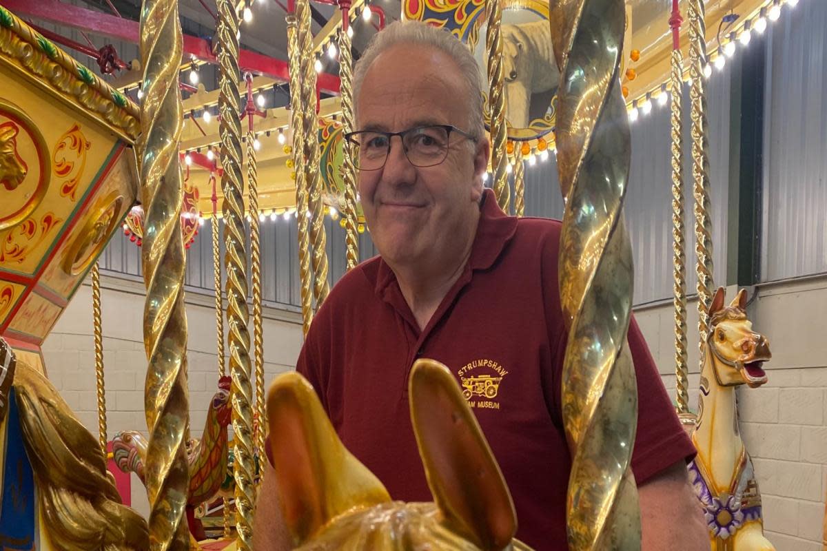 Malcolm Potts on his restored Gallopers carousel at Strumpshaw Steam Museum Picture: Chris Bond <i>(Image: Chris Bond)</i>