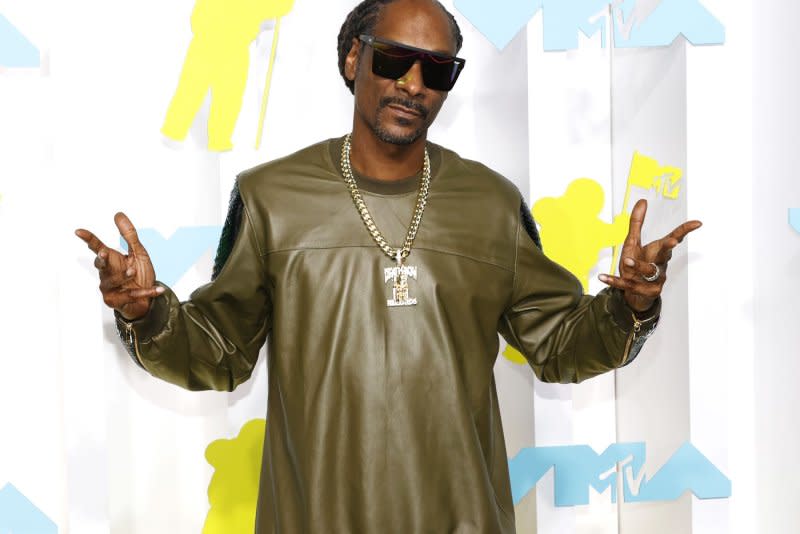 Snoop Dogg performed with Will Ferrell and John C. Reilly at a charity event in Los Angeles during the weekend. File Photo by John Angelillo/UPI