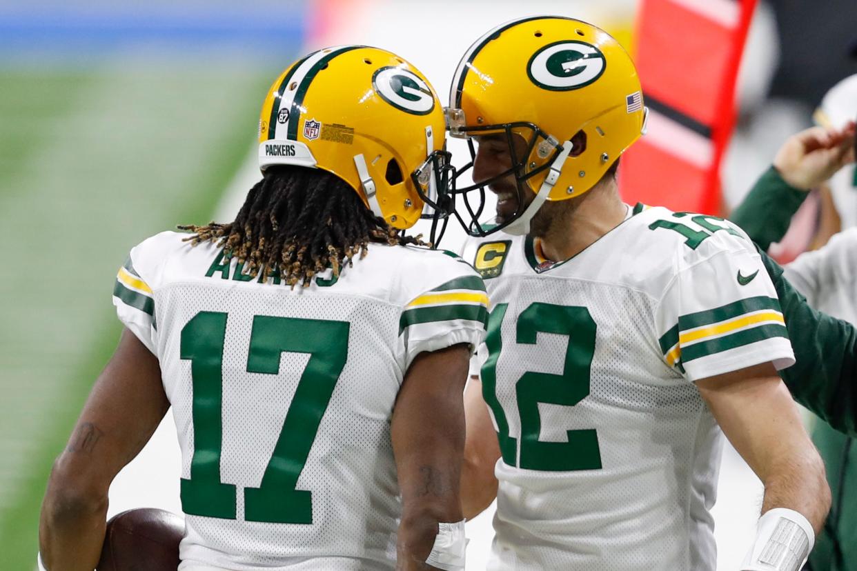 WR Davante Adams (17) and QB Aaron Rodgers were teammates for eight seasons in Green Bay.