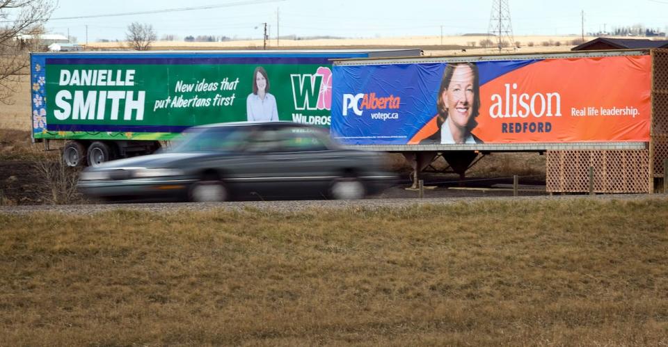 Billboards from the 2012 election of Wildrose Party Leader Danielle Smith and Progressive Conservative Leader Alison Redford, who would win re-election.