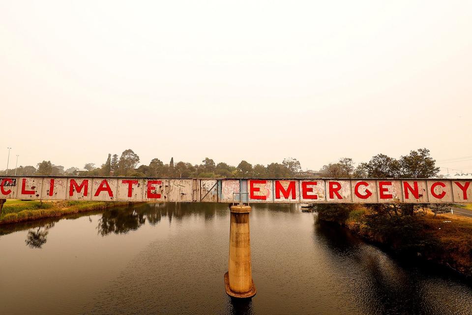 Poignant graffiti is seen on a bridge on Jan. 3 in Bairnsdale, Australia. 