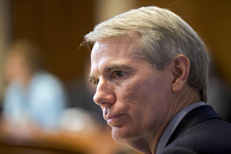 This photo made Thursday, March 21, 2013, shows Sen. Rob Portman, R-Ohio, on Capitol Hill in Washington. (AP Photo/J. Scott Applewhite)