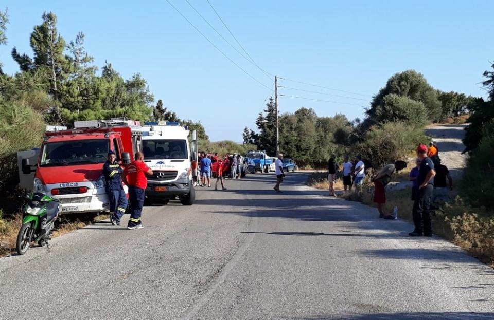 Authorities and residents gather near the location where police said the body of Cyprus-based astrophysicist Natalie Christopher, 34, was found in a 20-meter-deep ravine, in Faros village on the Greek island of Ikaria, Wednesday, Aug. 7, 2019. Greek authorities say search crews have found the body of a British scientist who went missing while on holiday on the Aegean island of Ikaria in a ravine near where the woman had been staying. (ikariaki.gr via AP)