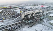 This image made from video shows aftermath of a high-speed train crash at a station in Ankara, Turkey, Thursday, Dec. 13, 2018. The train hit a railway engine and crashed into a pedestrian overpass at the station on Thursday. (DHA via AP)