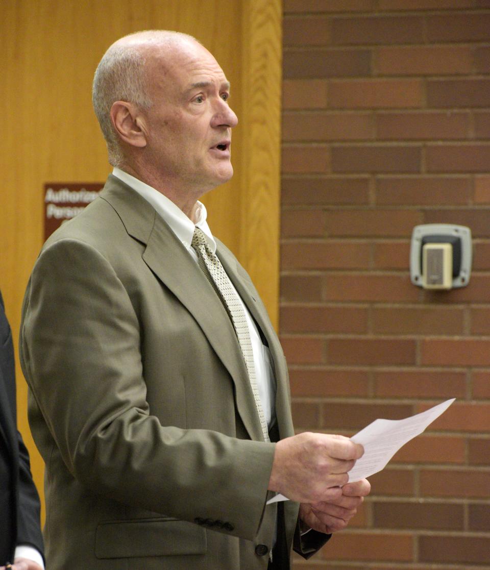 Michael Konschak reads a statement during an appearance in Danbury Superior Court Wednesday, March 1, 2023, in Danbury, Conn.