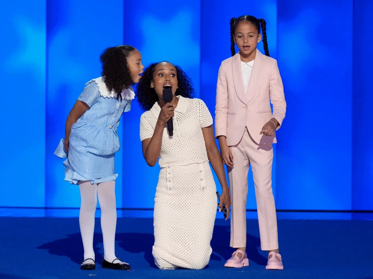 Kerry Washington and Kamala Harris’ grandnieces, Amara and Leela, instructing the crowd on how to pronounce the Vice President’s name at the DNC on Thursday (AP)