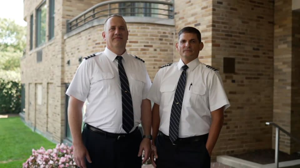 First Officer Robert Bradeen, left, and Captain Hugo Carvajal averted a crash when a Southwest plane was cleared for takeoff as they were approaching to land their FedEx cargo plane last year in Austin. - CNN