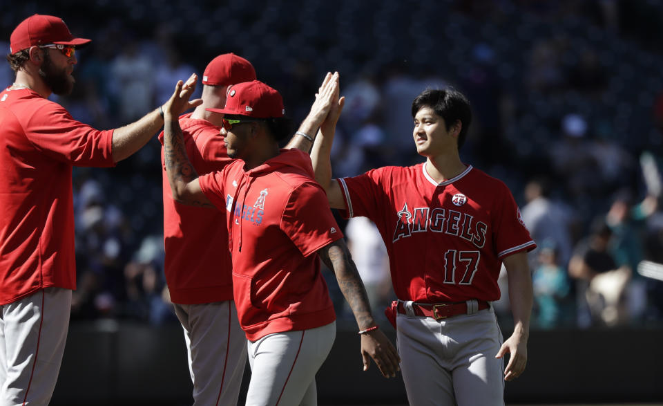 Pujols, Trout homer, Goodwin 2 HRs, Angels beat Mariners 9-3