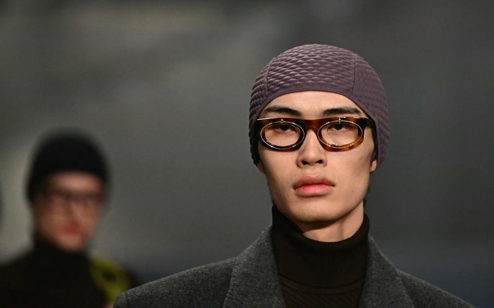 A model walks the runway at the Prada collection show during the Milan Fashion Week Menswear Autumn/Winter 2024/2025