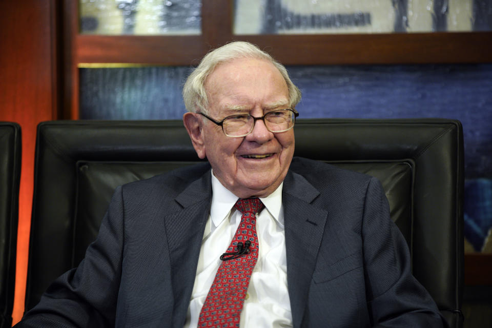 FILE - Berkshire Hathaway Chairman and CEO Warren Buffett smiles during an interview in Omaha, Neb., May 7, 2018. Buffett's company continues selling off its BYD shares despite the positive comments he has made about the Chinese electric car maker in the past, but Berkshire Hathaway remains a major shareholder. (AP Photo/Nati Harnik, File)