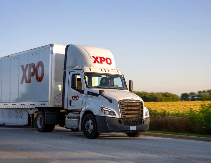 An XPO truck on the road.