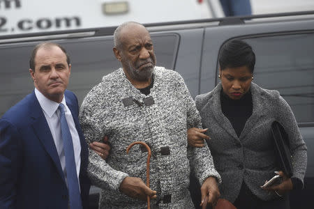 Actor and comedian Bill Cosby arrives with attorney Monique Pressley (R) for his arraignment on sexual assault charges at the Montgomery County Courthouse in Elkins Park, Pennsylvania December 30, 2015. REUTERS/Mark Makela
