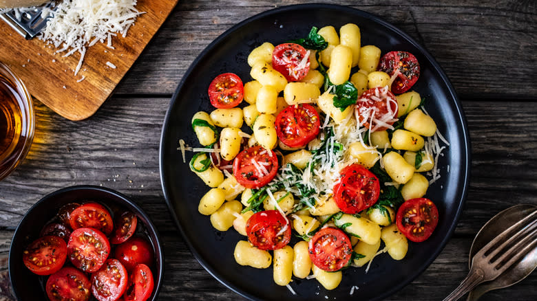 Gnocchi with tomatoes, mozzarella, and basil