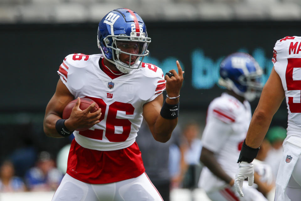 Saquon Barkley is one of the top NFL players reportedly holding out. (AP Photo/John Munson)