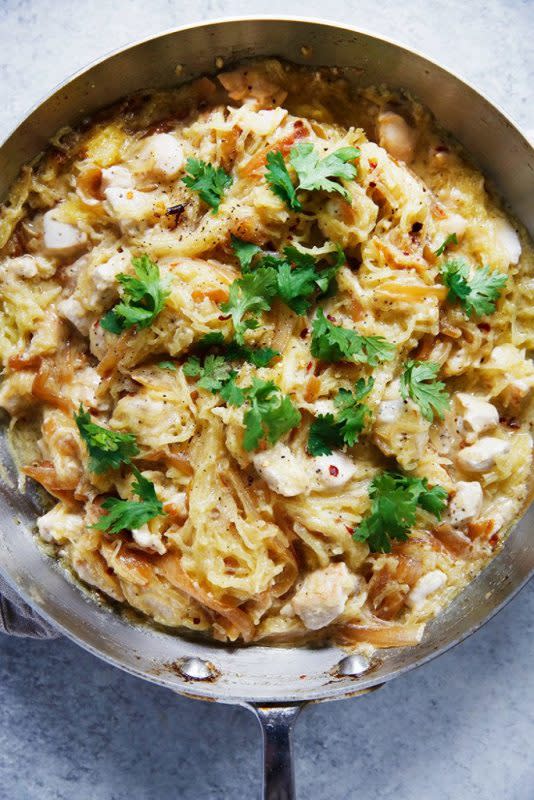 <p>Lexi's Clean Kitchen</p><p>Creamy, delicious yet low-carb all at once, this spaghetti squash alfredo with chicken and caramelized onions will have you begging for more!</p><p><a href="http://lexiscleankitchen.com/2016/09/14/spaghetti-squash-alfredo-with-chicken-and-caramelized-onions/" rel="nofollow noopener" target="_blank" data-ylk="slk:Get the recipe here!;elm:context_link;itc:0;sec:content-canvas" class="link "><em><strong>Get the recipe here!</strong></em></a></p>