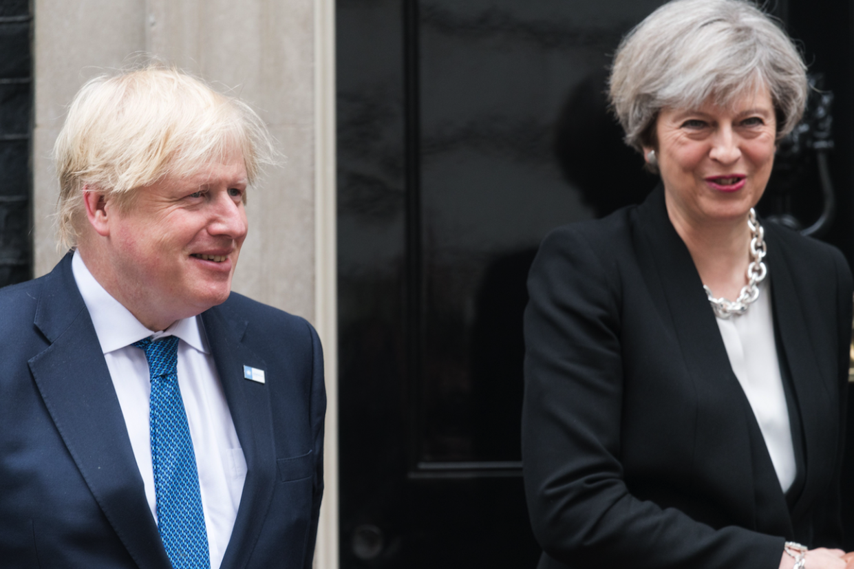 Boris Johnson and Theresa May (REX)