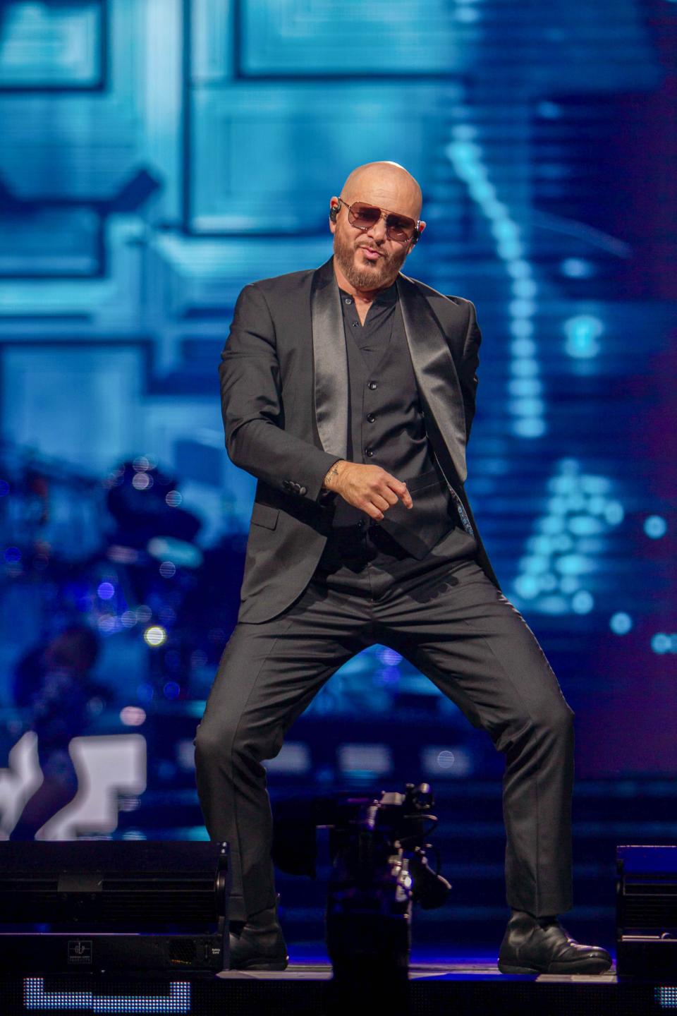 Nov 25, 2023; Phoenix, AZ, United States; Pitbull performs at the Trilogy Tour at the Footprint Center. Sam Ballesteros/The Republic