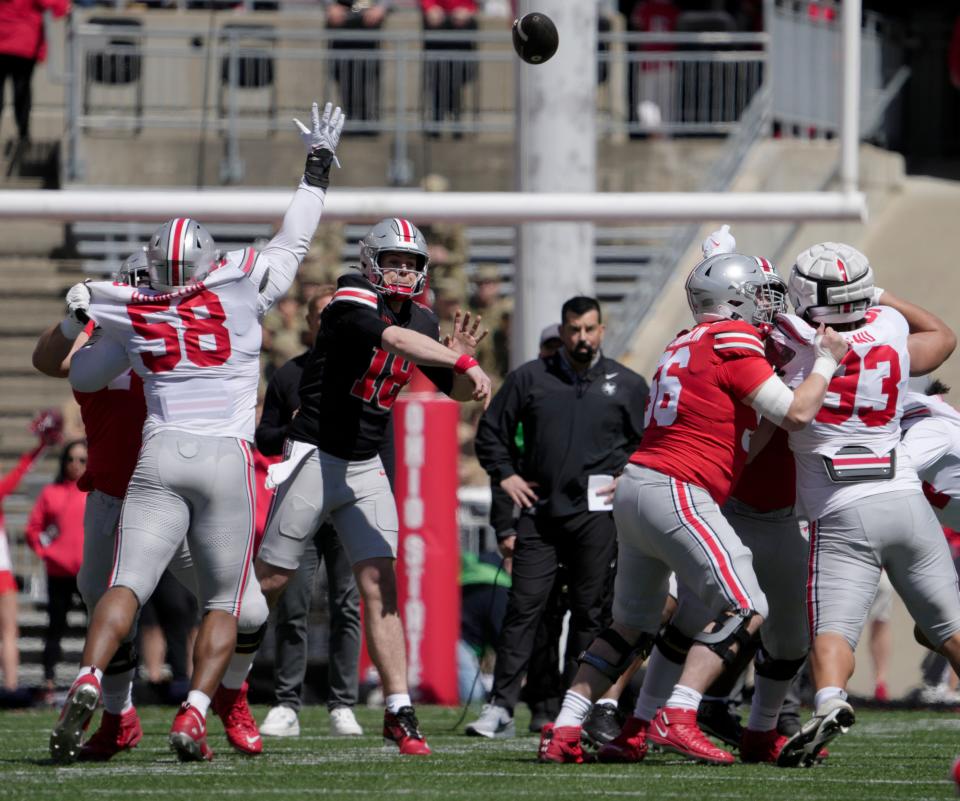 Ohio State quarterback Will Howard completed 9 of 13 passes for 77 yards in Saturday's spring game.