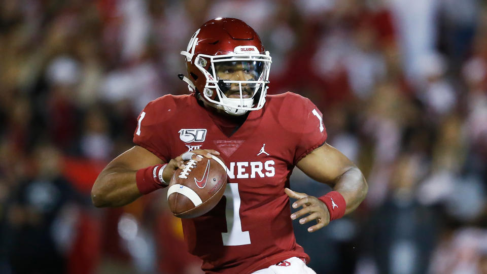 What is Jalen Hurts' role in Philadelphia next to Carson Wentz? (AP Photo/Sue Ogrocki)