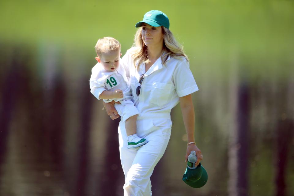 AUGUSTA, GEORGIA - APRIL 10: Jillian Stacey, wife of Keegan Bradley of the United States (not pictured), holds son Logan James during the Par 3 Contest prior to the Masters at Augusta National Golf Club on April 10, 2019 in Augusta, Georgia. (Photo by Andrew Redington/Getty Images)