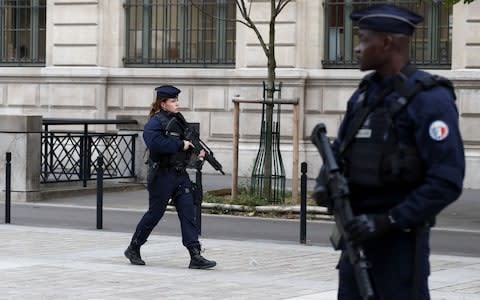 rench police and security forces establish a security perimeter near Paris police headquarters - Credit: IAN LANGSDON/EPA-EFE/REX