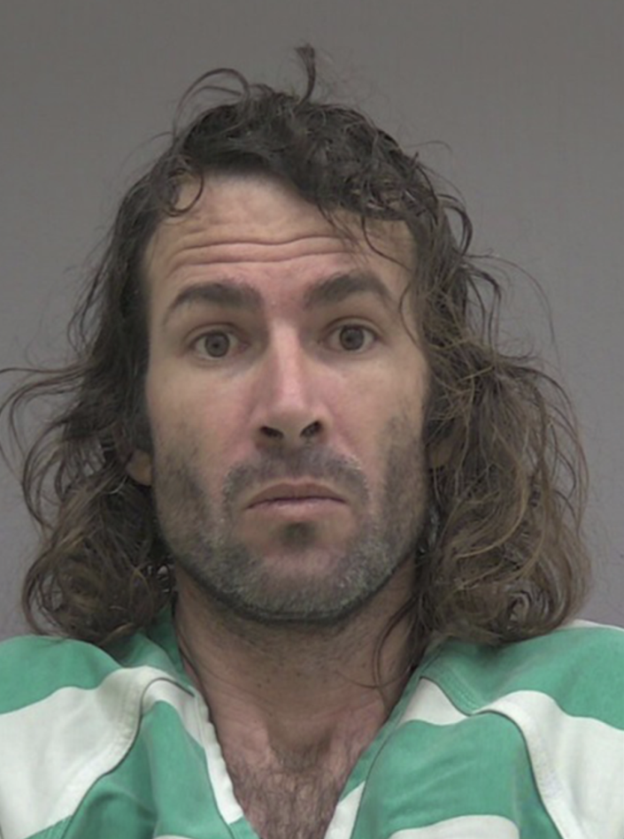 Michael Dougherty, 40, has been charged with the attempted murder of Lisa Ann Rogers (Alachua County Jail)