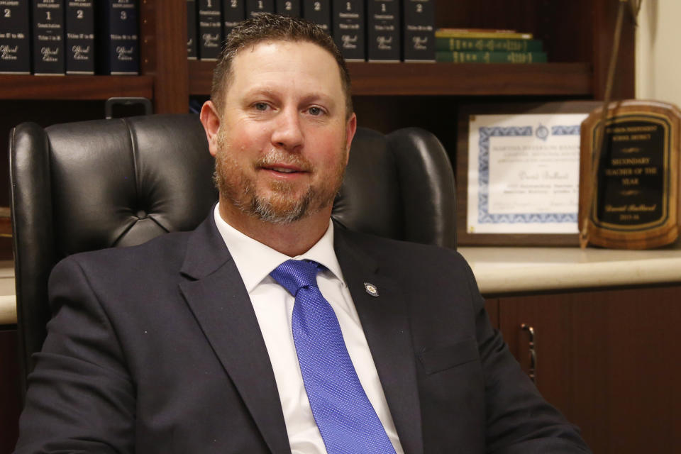 FILE - In this Feb. 6, 2019, file photo, state Sen. David Bullard poses for a portrait in his office in Oklahoma City. In 2023, Bullard evoked a biblical passage in introducing what he calls the Millstone Act — a bill that would make it a felony for doctors to provide gender transition procedures to anyone under the age of 26. Bullard, who has served as a deacon at his Baptist church, said the act’s name alludes to a passage in the Book of Matthew suggesting that anyone causing a child to sin should be drowned in the sea with a millstone hung around their neck. (AP Photo/Sue Ogrocki, File)