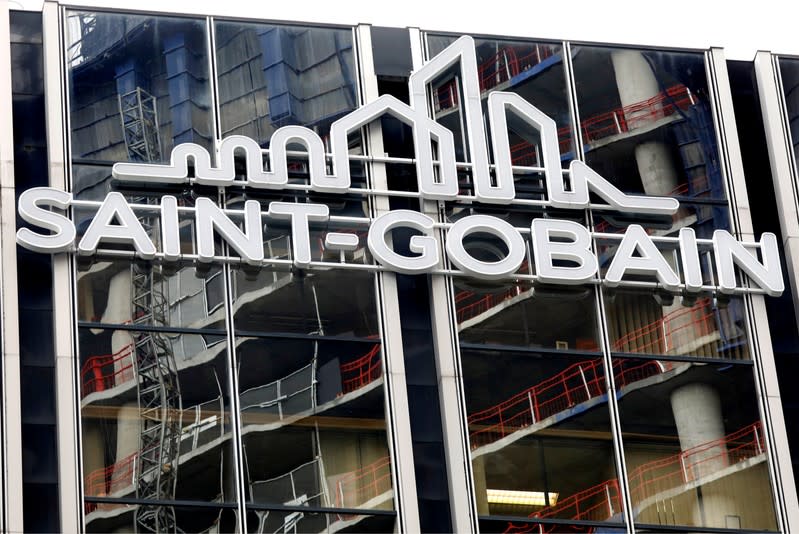 FILE PHOTO: The Saint-Gobain logo is seen on top of the company's headquarters building at the La Defense business district, Paris