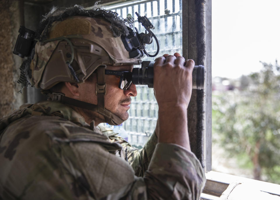 A U.S. paratrooper conducts security at Hamid Karzai International Airport in Kabul on Aug. 28, 2021. 