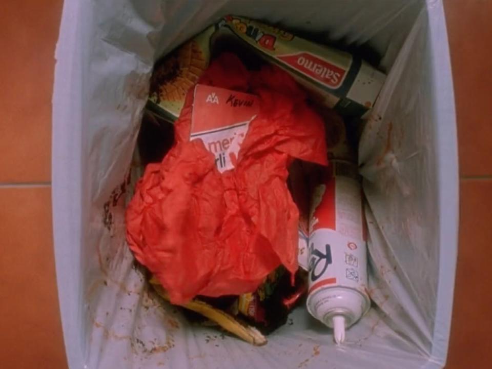 Kevin’s plane ticket is thrown in the bin in ’Home Alone’ (20th Century Fox)