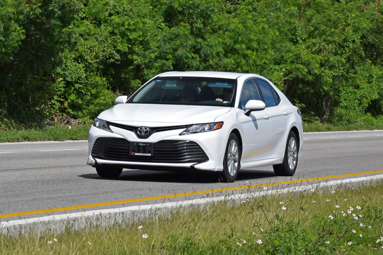 Cancun, Mexico - 11 January, 2018: Modern Toyota Camry driving on the road. The eight generation of Toyota Camry was debut in 2017. This model is one of the most popular Toyota vehicles in North America.