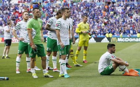 Football Soccer - France v Republic of Ireland - EURO 2016 - Round of 16 - Stade de Lyon, Lyon, France - 26/6/16 (L-R) Republic of Ireland's Stephen Quinn, Robbie Keane, Seamus Coleman, Shay Given and Shane Long react after the game REUTERS/Robert Pratta Livepic