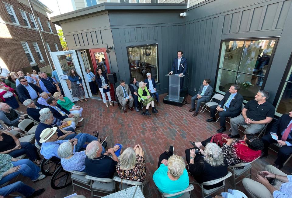 Mayor Deaglan McEachern speaks as a large crowd gathered on Court Street for the official dedication of Portsmouth affordable housing development named Ruth Lewin Griffin Place Wednesday, June 8, 2022.