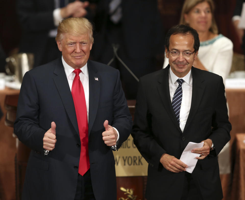 Donald Trump and John Paulson Credit: AP Photo/Seth Wenig