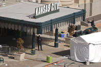 A security guard stands outside of Union Station Thursday, Feb. 15, 2024, in Kansas City, Mo. The venue was the site of a mass shooting Wednesday after a rally celebrating the Kansas City Chiefs winning the NFL Super Bowl 58 football game. (AP Photo/Charlie Riedel)