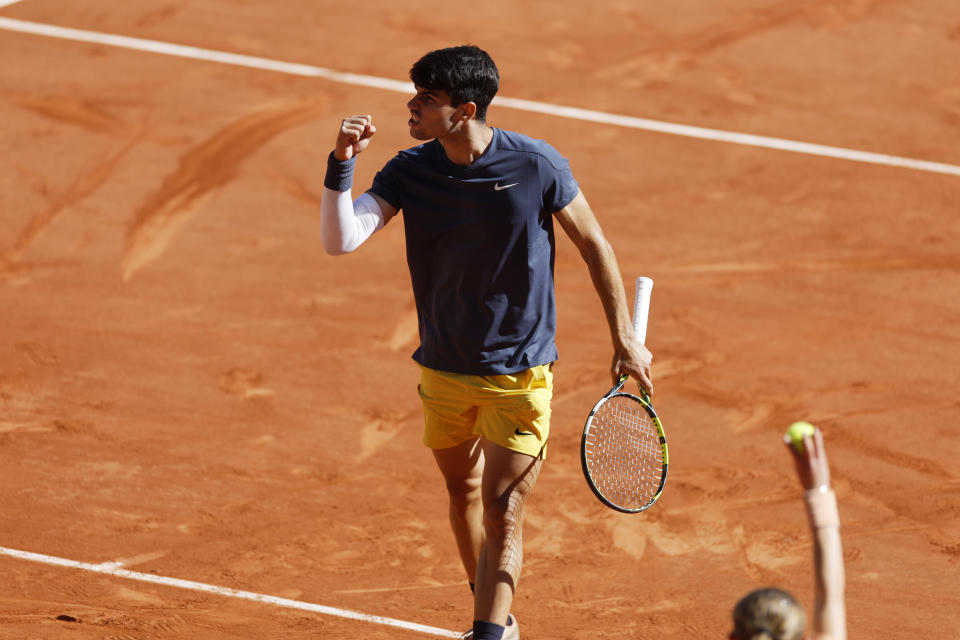 Spain's Carlos Alcaraz reacts during his semifinal match of the French Open tennis tournament against Italy's Jannik Sinner at the Roland Garros stadium in Paris, Friday, June 7, 2024. (AP Photo/Jean-Francois Badias)