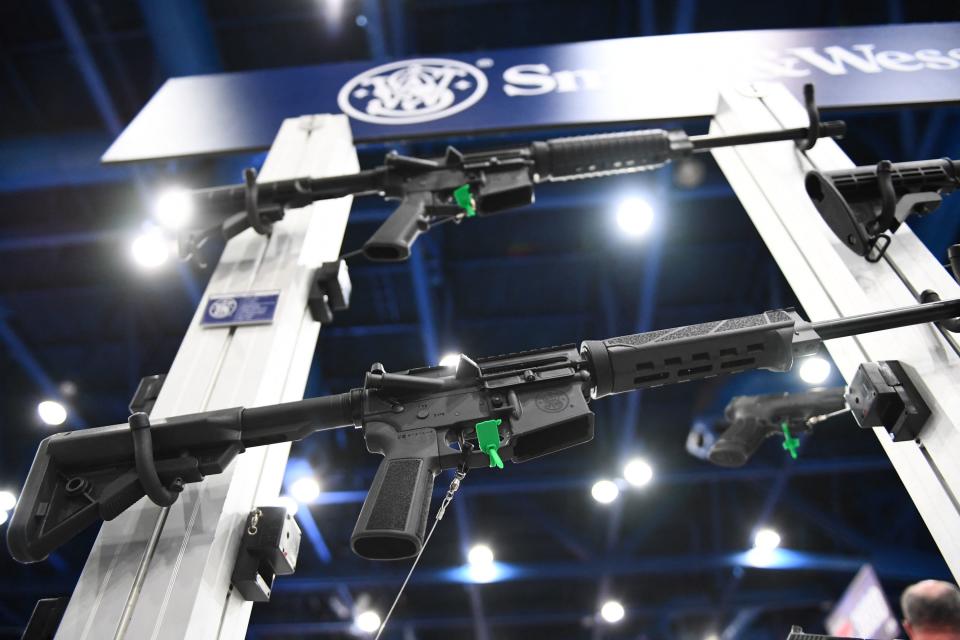 Smith & Wesson M&P15 semiautomatic rifles are displayed during the National Rifle Association annual meeting in Houston on May 28.