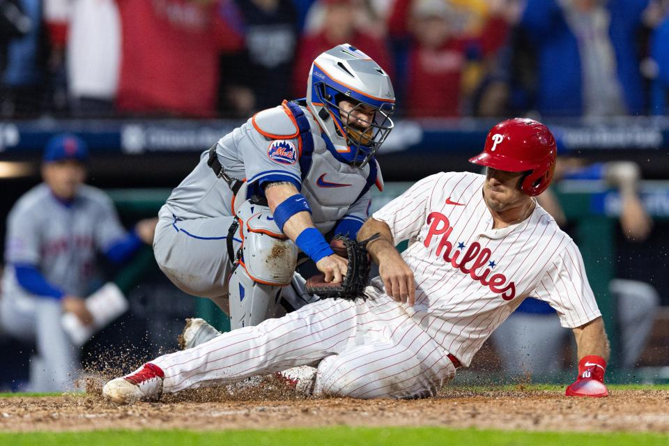 Philadelphia Phillies catcher J.T. Realmuto (10) is tagged out at home plate during the fifth inning Wednesday, May 15, 2024, at Citizens Bank Park in Philadelphia.
