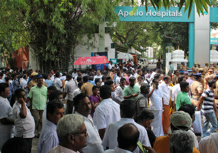 Well wishers of Tamil Nadu Chief Minister Jayalalithaa Jayaraman gather outside a hospital where Jayalalithaa is being treated in Chennai, India, December 5, 2016. REUTERS/Stringer