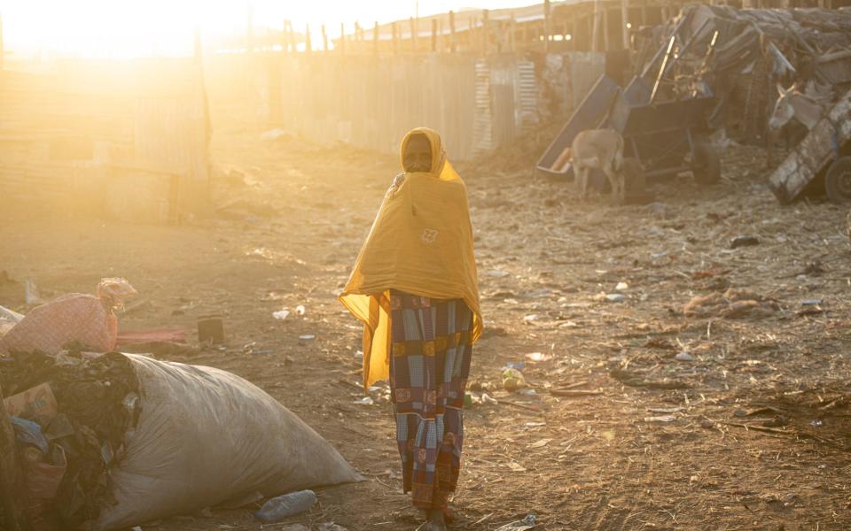 A ethnic Fulani woman walks a refugee camp in Bamako, Mali's capital. Around a million people were forced to flee their homes because of violence across the Sahel region last year.  - Simon Townsley/The Telegraph