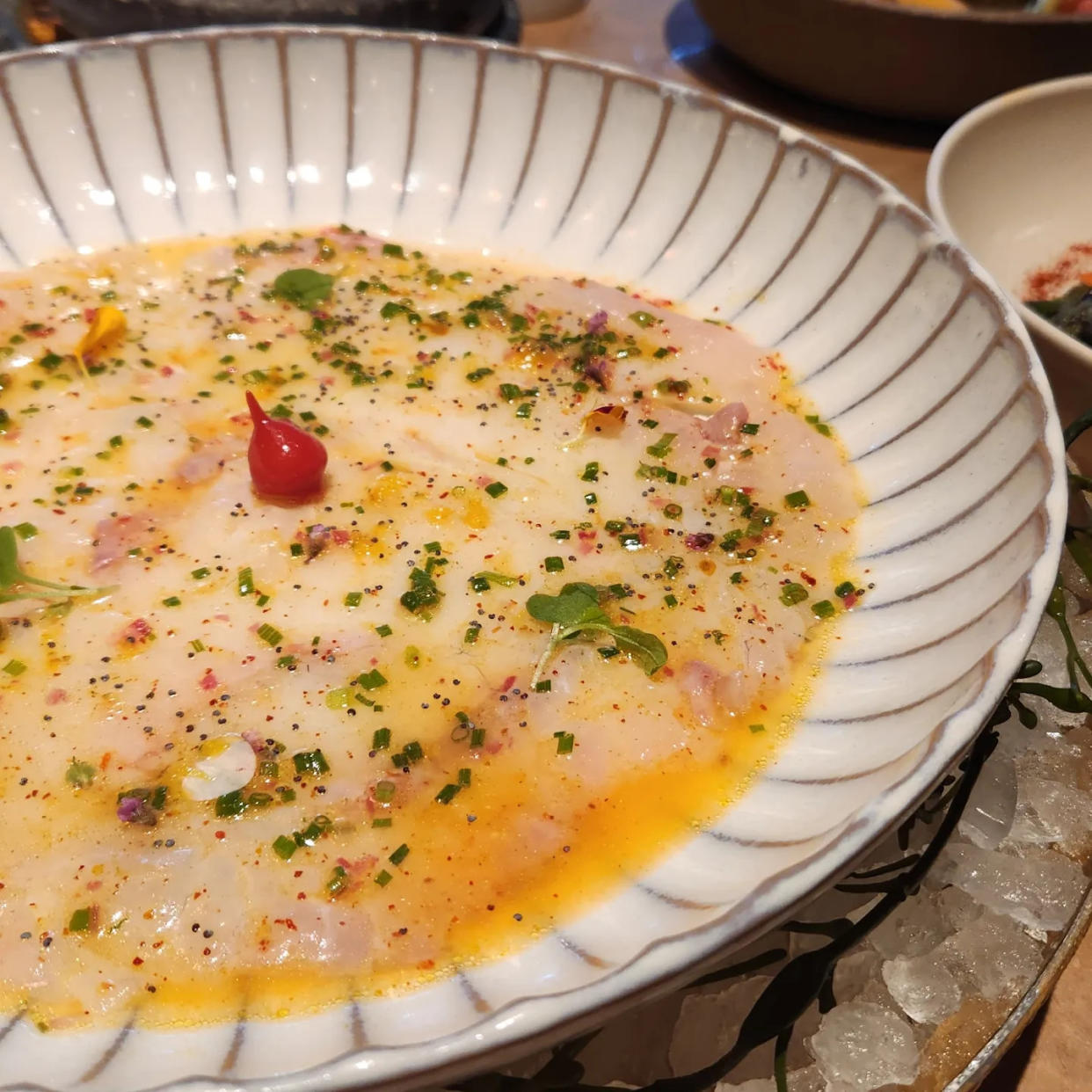 Sea bream (white fish) carpaccio topped with calamansi (a citrus fruit) and olive oil at Ava MediterrAegean. (Photo: Holly Kapherr)