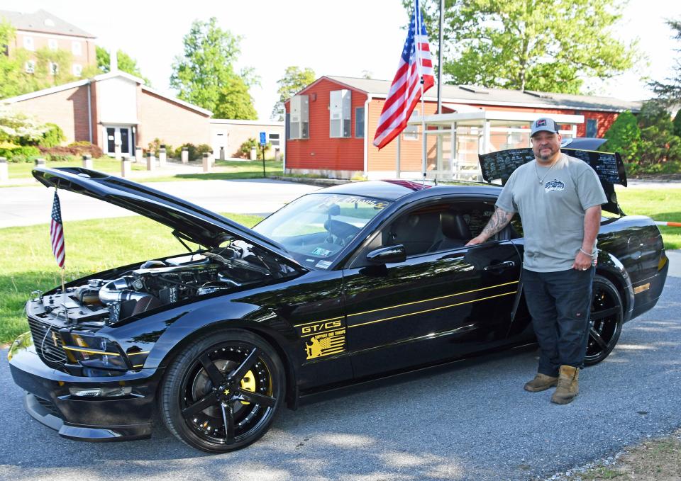 Robert Villeaume, of Lancaster, spent three years customizing his Mustang GT California Special to honor his father's service and the memory of his daughter. Villeaume's Mustang was displayed outside the Lebanon VA Medical Center on Friday, April 3.