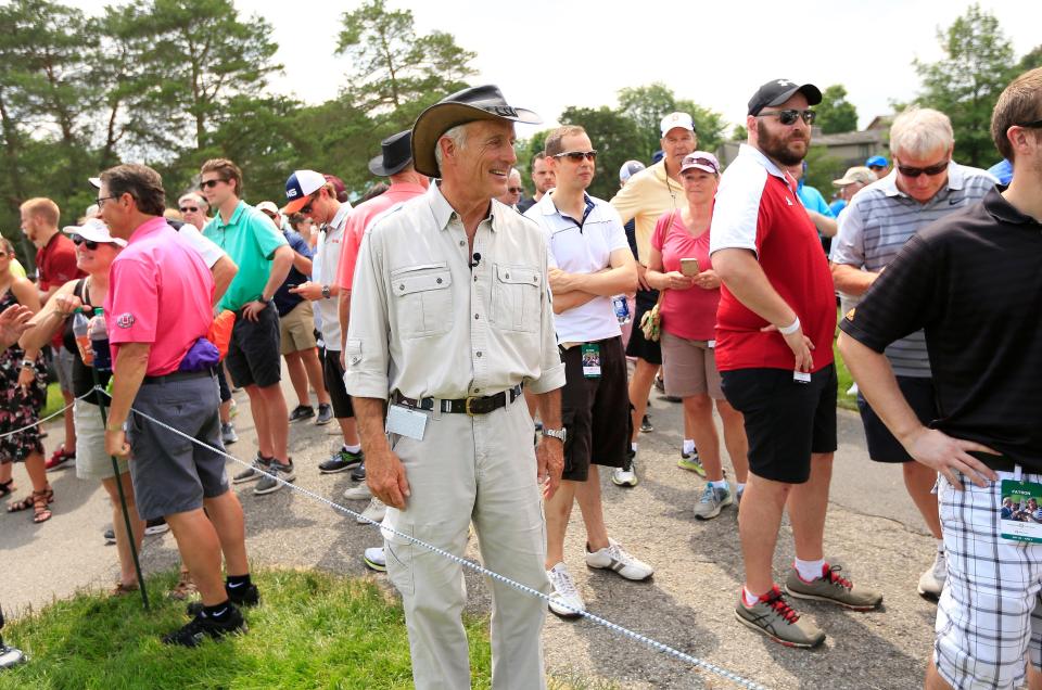 Jack Hanna stands with golf patrons on the fifth hole as he watches the first round of the Memorial Tournament at Muirfield Village Golf Club in Dublin, Ohio, on May 31, 2018.