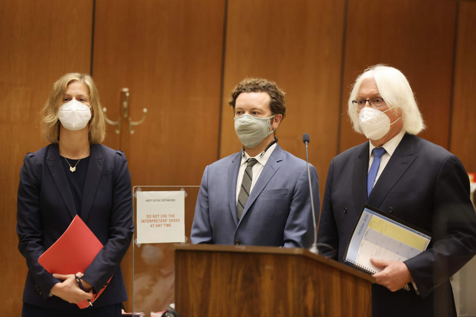 Danny Masterson with his lawyers Thomas Mesereau and Sharon Appelbaum as he is arraigned on three rape charges in separate incidents in 2001 and 2003, at Los Angeles Superior Court on  Sept. 18, 2020. (Lucy Nicholson  / AFP via Getty Images pool file)