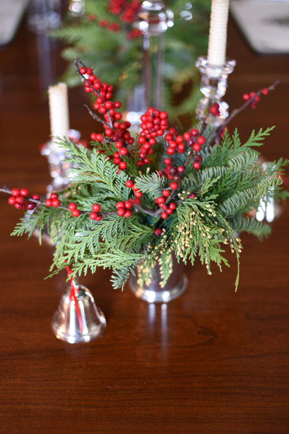 Cedar and winterberry holly make a nice combination when decorating for the holiday season.