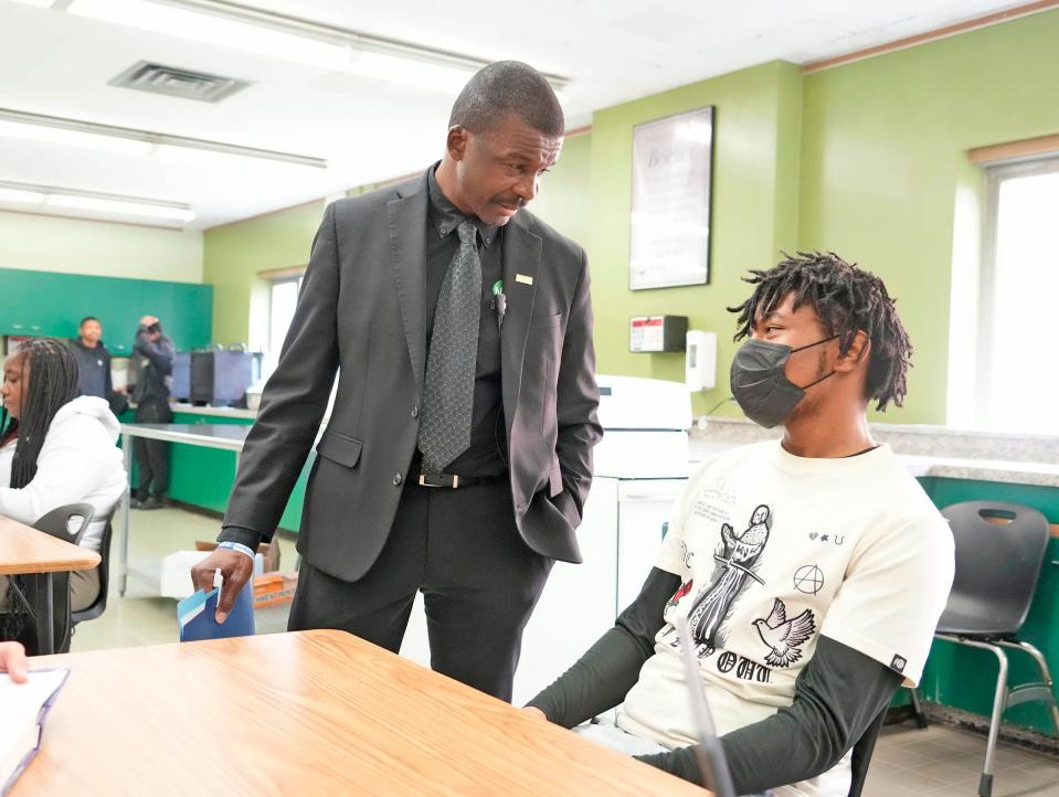 Principal Alonzo Fuller takes a moment with a student at Milwaukee Public School’s James Madison High School.