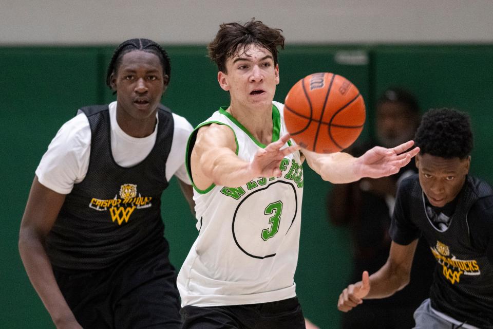 Westfield High School's Trey Buchanan (3) makes a pass during Charlie Hughes Shootout basketball action, Saturday, June 24, 2023, at Westfield High School.