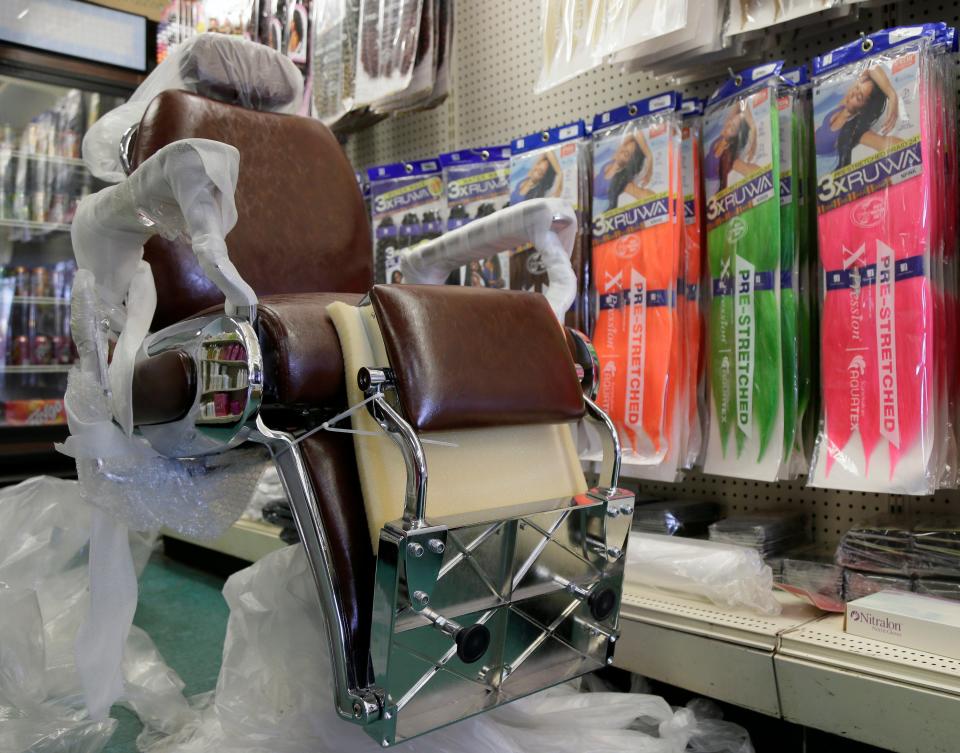 A barber's chair sits on display inside Willis Beauty Supply on East Livingston Avenue in Driving Park.