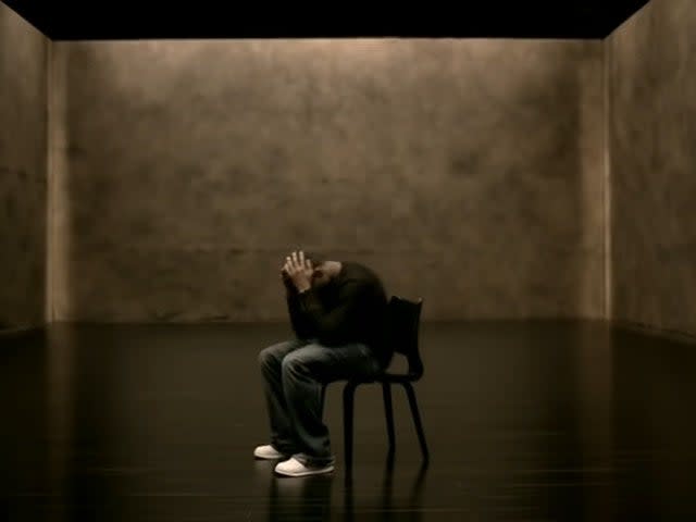 usher in a chair in "confessions, pt. II" music video